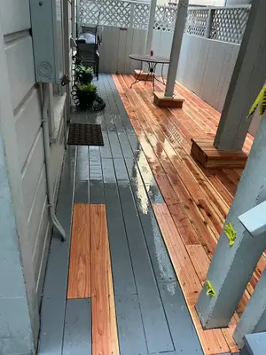 Redwood deck board replacement under construction