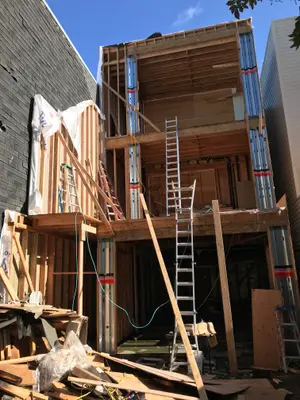 Multi-story structural wood framing construction