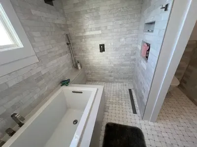 Custom Bathroom Remodel with Tiled Tub Surround