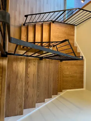 Custom Wooden Staircase and Metal Handrail