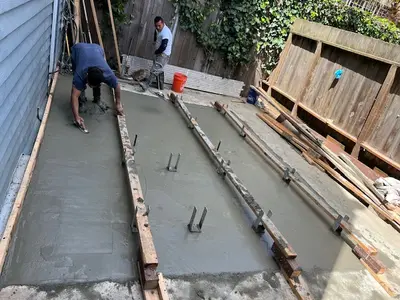 Pouring and Leveling Concrete Foundation Slab